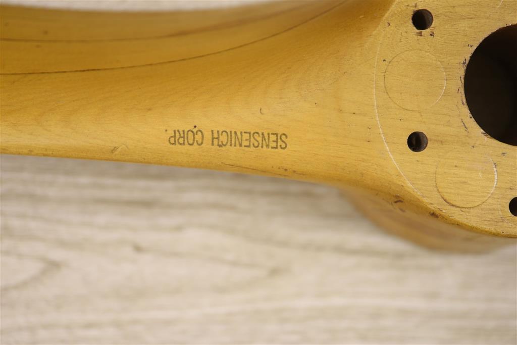 A Sensenich Corp. laminated wooden propellor, model number 276-17, Serial number 17991, length 112cm